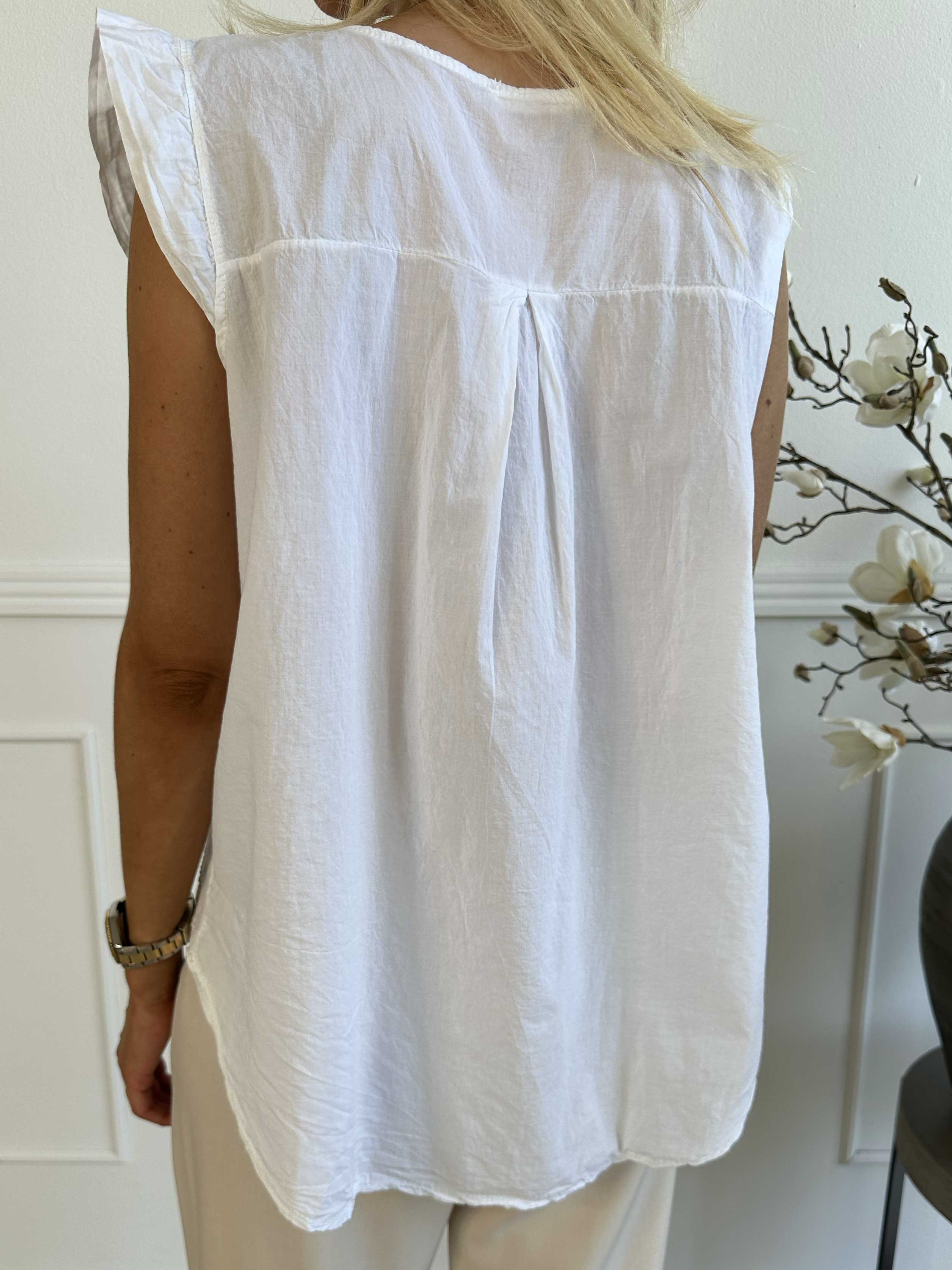 Kreta - Söt tunika i bomull med blommor och volangärmar